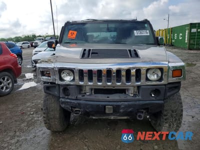 Piąte zdjęcie samochodu w środku: 2004 HUMMER H2 VIN:5GRGN23U64H111278 - miniatura