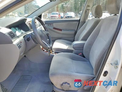 Zdjęcie 7 z 11 samochodu: 2003 TOYOTA COROLLA LE VIN:JTDBR38E930045975 - miniatura