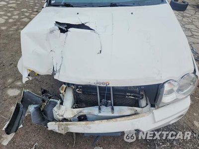 Zdjęcie 12 z 13 samochodu: 2007 JEEP GRAND CHEROKEE LAREDO VIN:1J8GR48K17C521585 - miniatura