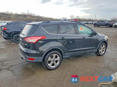 Trzecie zdjęcie samochodu z tyłu: 2015 FORD ESCAPE SE VIN:1FMCU0G90FUB91972 - miniatura
