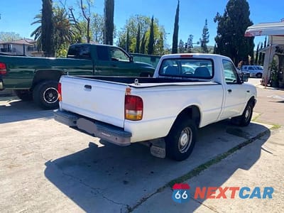 Czwarte zdjęcie samochodu z boku: 1994 FORD RANGER VIN:1FTCR10U1RPB90200 - miniatura