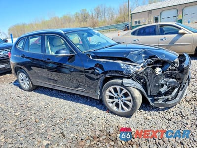 Czwarte zdjęcie samochodu z boku: 2014 BMW X1 XDRIVE28I VIN:WBAVL1C5XEVY11502 - miniatura