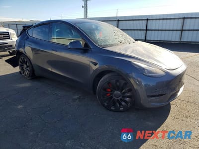 Czwarte zdjęcie samochodu z boku: 2022 TESLA MODEL Y VIN:7SAYGDEF5NF451729 - miniatura