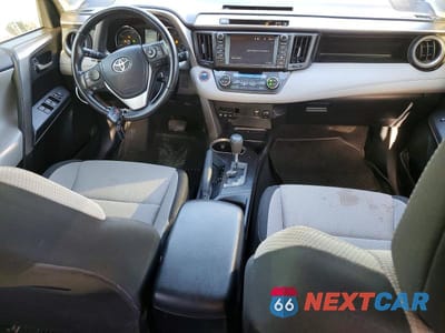 Zdjęcie 8 z 14 samochodu: 2018 TOYOTA RAV4 HYBRID XLE VIN:JTMRJREV8JD201216 - miniatura