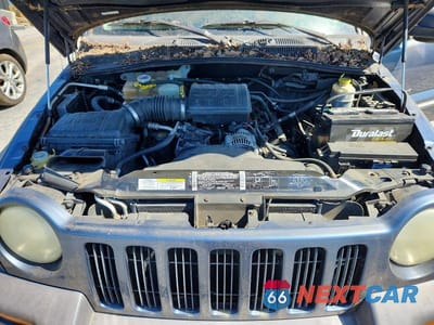 Zdjęcie 12 z 13 samochodu: 2002 JEEP LIBERTY SPORT VIN:1J4GL48K02W297445 - miniatura