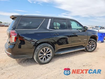 Trzecie zdjęcie samochodu z tyłu: 2023 CHEVROLET TAHOE C1500 LT VIN:1GNSCNKD2PR523191 - miniatura