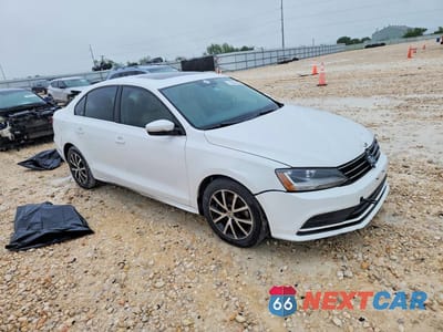 Czwarte zdjęcie samochodu z boku: 2017 VOLKSWAGEN JETTA SE VIN:3VWB67AJXHM321184 - miniatura