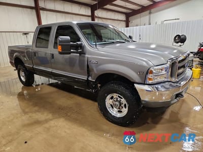 Czwarte zdjęcie samochodu z boku: 2002 FORD F250 SUPER DUTY VIN:1FTNW21S62EC70680 - miniatura