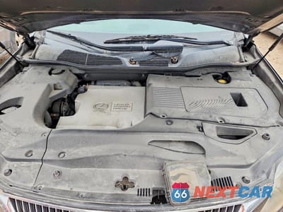 Zdjęcie 11 z 12 samochodu: 2012 LEXUS RX 450H VIN:JTJZB1BA7C2006350 - miniatura