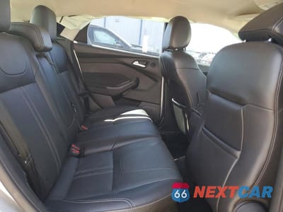 Zdjęcie 10 z 13 samochodu: 2014 FORD FOCUS TITANIUM VIN:1FADP3N26EL299837 - miniatura