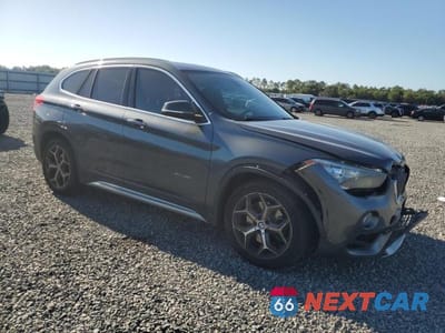 Czwarte zdjęcie samochodu z boku: 2018 BMW X1 SDRIVE28I VIN:WBXHU7C34J5L05157 - miniatura