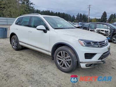 Czwarte zdjęcie samochodu z boku: 2016 VOLKSWAGEN TOUAREG LUXURY 3.6L VIN:WVGEF9BP9GD010835 - miniatura