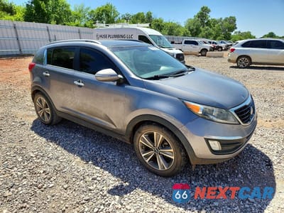 Czwarte zdjęcie samochodu z boku: 2014 KIA SPORTAGE SX VIN:KNDPC3A6XE7581354 - miniatura