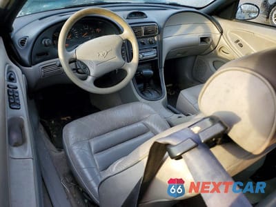 Zdjęcie 8 z 11 samochodu: 1997 FORD MUSTANG VIN:1FALP444XVF151502 - miniatura