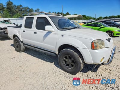 Czwarte zdjęcie samochodu z boku: 2002 NISSAN FRONTIER XE-V6 VIN:1N6ED27T72C351993 - miniatura