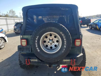 Zdjęcie 6 z 11 samochodu: 1999 JEEP WRANGLER / TJ SPORT VIN:1J4FY19S1XP424277 - miniatura