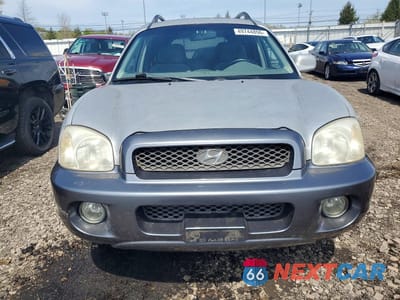Piąte zdjęcie samochodu w środku: 2003 HYUNDAI SANTA FE VIN:KM8SC73D03U410314 - miniatura