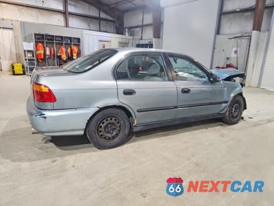Trzecie zdjęcie samochodu z tyłu: 1999 HONDA CIVIC LX VIN:2HGEJ6677XH582180 - miniatura