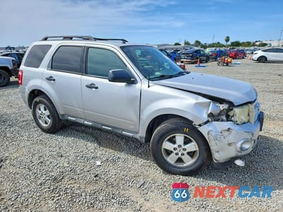 Czwarte zdjęcie samochodu z boku: 2011 FORD ESCAPE VIN:1FMCU0D76BKA14769 - miniatura