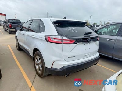 Trzecie zdjęcie samochodu z tyłu: 2020 FORD EDGE SE VIN:2FMPK3G94LBB30733 - miniatura