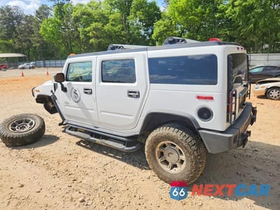 Drugie zdjęcie samochodu z przodu: 2003 HUMMER H2 VIN:5GRGN23U43H130412 - miniatura