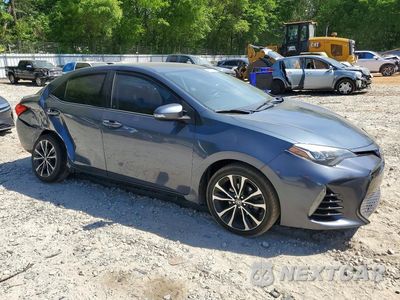 Czwarte zdjęcie samochodu z boku: 2017 TOYOTA COROLLA SE VIN:5YFBURHE2HP635031 - miniatura