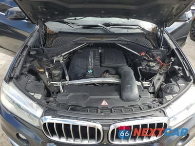 Zdjęcie 11 z 12 samochodu: 2014 BMW X5 SDRIVE35I VIN:5UXKR2C5XE0H31965 - miniatura