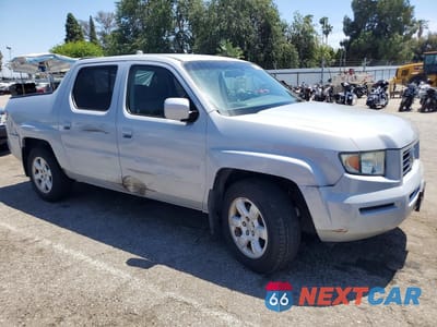 Czwarte zdjęcie samochodu z boku: 2006 HONDA RIDGELINE RTS VIN:2HJYK16476H576018 - miniatura