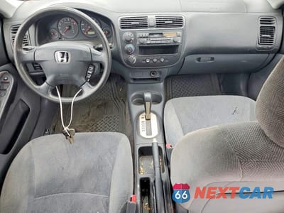 Zdjęcie 8 z 12 samochodu: 2001 HONDA CIVIC LX VIN:1HGES165X1L049779 - miniatura