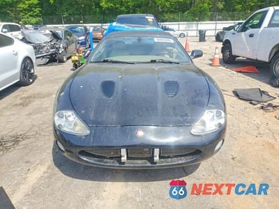 Piąte zdjęcie samochodu w środku: 2002 JAGUAR XKR VIN:SAJDA42B02PA25774 - miniatura