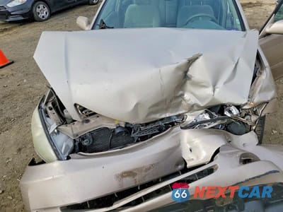 Zdjęcie 11 z 12 samochodu: 2004 TOYOTA CAMRY XLE VIN:4T1BE30K64U347291 - miniatura