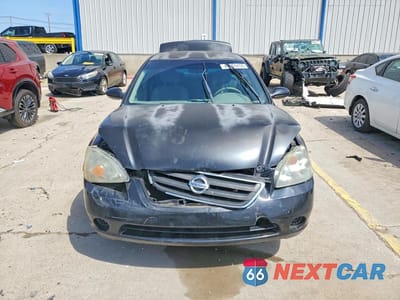 Piąte zdjęcie samochodu w środku: 2003 NISSAN ALTIMA 2.5 VIN:1N4AL11D73C139487 - miniatura