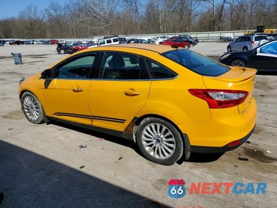 Drugie zdjęcie samochodu z przodu: 2012 FORD FOCUS TITANIUM VIN:1FAHP3J23CL271918 - miniatura