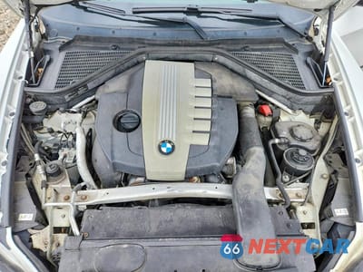 Zdjęcie 12 z 14 samochodu: 2012 BMW X5 XDRIVE35D VIN:5UXZW0C56C0B88025 - miniatura