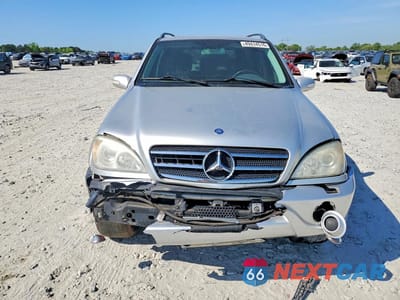 Piąte zdjęcie samochodu w środku: 2002 MERCEDES-BENZ ML 500 VIN:4JGAB75E72A324616 - miniatura