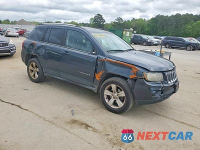 Czwarte zdjęcie samochodu z boku: 2014 JEEP COMPASS LATITUDE VIN:1C4NJDEB1ED530286 - miniatura