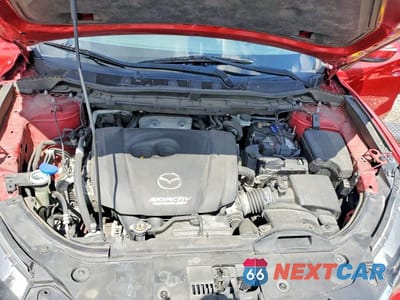 Zdjęcie 11 z 12 samochodu: 2016 MAZDA CX-5 TOURING VIN:JM3KE2CY4G0912414 - miniatura