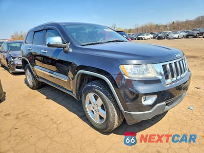 Czwarte zdjęcie samochodu z boku: 2011 JEEP GRAND CHEROKEE LAREDO VIN:1J4RS4GG9BC577343 - miniatura
