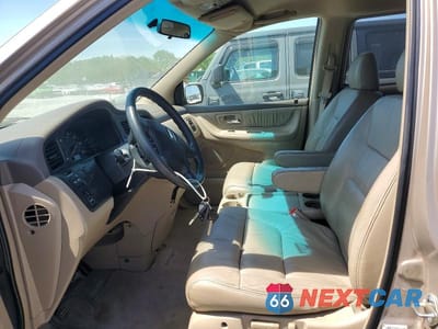 Zdjęcie 7 z 13 samochodu: 2003 HONDA ODYSSEY EXL VIN:5FNRL18953B047182 - miniatura