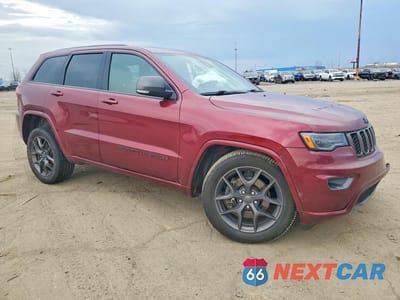 Czwarte zdjęcie samochodu z boku: 2021 JEEP GRAND CHEROKEE LIMITED VIN:1C4RJFBG0MC856419 - miniatura