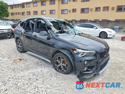 Czwarte zdjęcie samochodu z boku: 2017 BMW X1 XDRIVE28I VIN:WBXHT3C34H5F80598 - miniatura