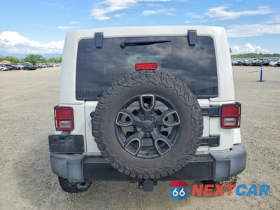 Zdjęcie 6 z 11 samochodu: 2018 JEEP WRANGLER UNLIMITED SAHARA VIN:1C4HJWEGXJL889768 - miniatura