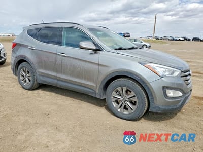 Czwarte zdjęcie samochodu z boku: 2015 HYUNDAI SANTA FE SPORT 2.0T VIN:5XYZUDLA2FG288680 - miniatura