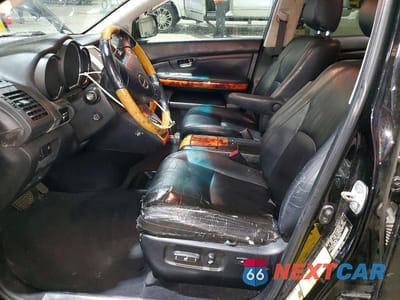 Zdjęcie 7 z 14 samochodu: 2008 LEXUS RX 350 BASE VIN:2T2GK31U58C038154 - miniatura