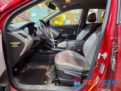 Zdjęcie 7 z 13 samochodu: 2012 HYUNDAI TUCSON GLS VIN:KM8JUCAC2CU397559 - miniatura