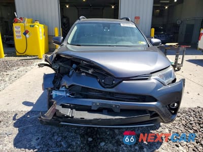 Piąte zdjęcie samochodu w środku: 2017 TOYOTA RAV4 HYBRID XLE VIN:JTMRJREV7HD062934 - miniatura