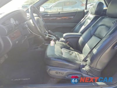 Zdjęcie 7 z 11 samochodu: 2002 CHRYSLER SEBRING LIMITED VIN:1C3EL65R12N306853 - miniatura