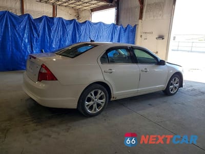 Trzecie zdjęcie samochodu z tyłu: 2012 FORD FUSION SE VIN:3FAHP0HAXCR357630 - miniatura