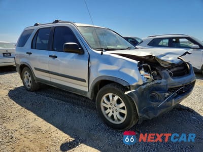 Czwarte zdjęcie samochodu z boku: 2006 HONDA CR-V LX VIN:JHLRD78576C045628 - miniatura