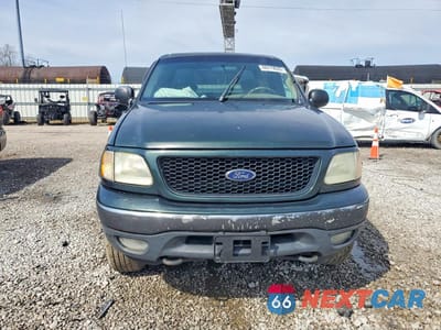 Piąte zdjęcie samochodu w środku: 2001 FORD F150 VIN:1FTRW08L21KC33498 - miniatura